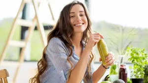 a lady drinking juice
